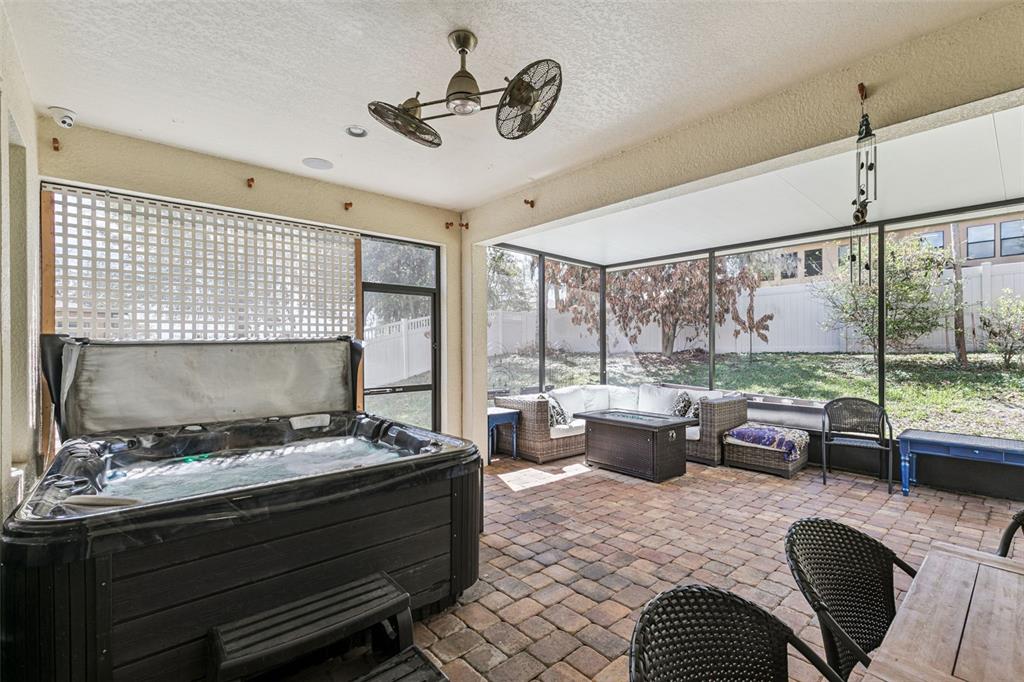 2541 Red Berry Way Ocoee, FL 34761 - Photo 31 of 49 a living room with furniture and a floor to ceiling window