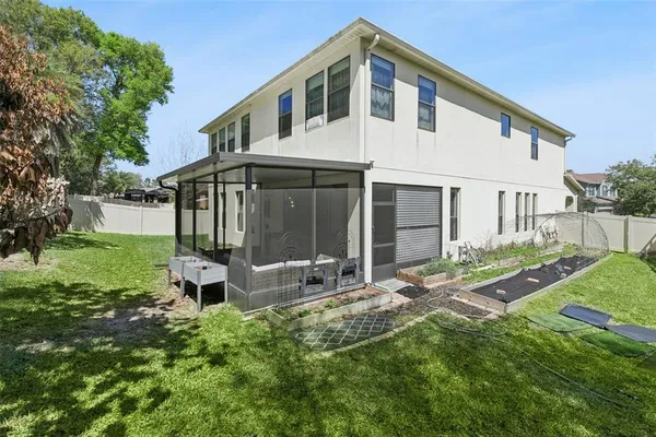 a view of house with yard