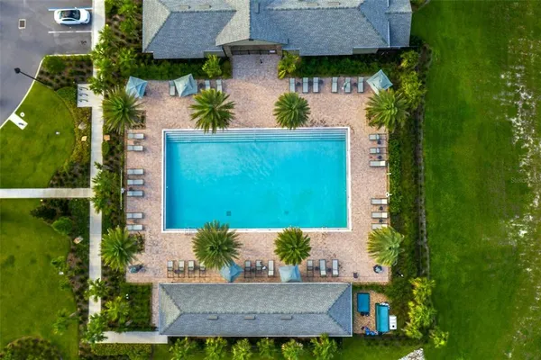 a view of a park with swings and slides