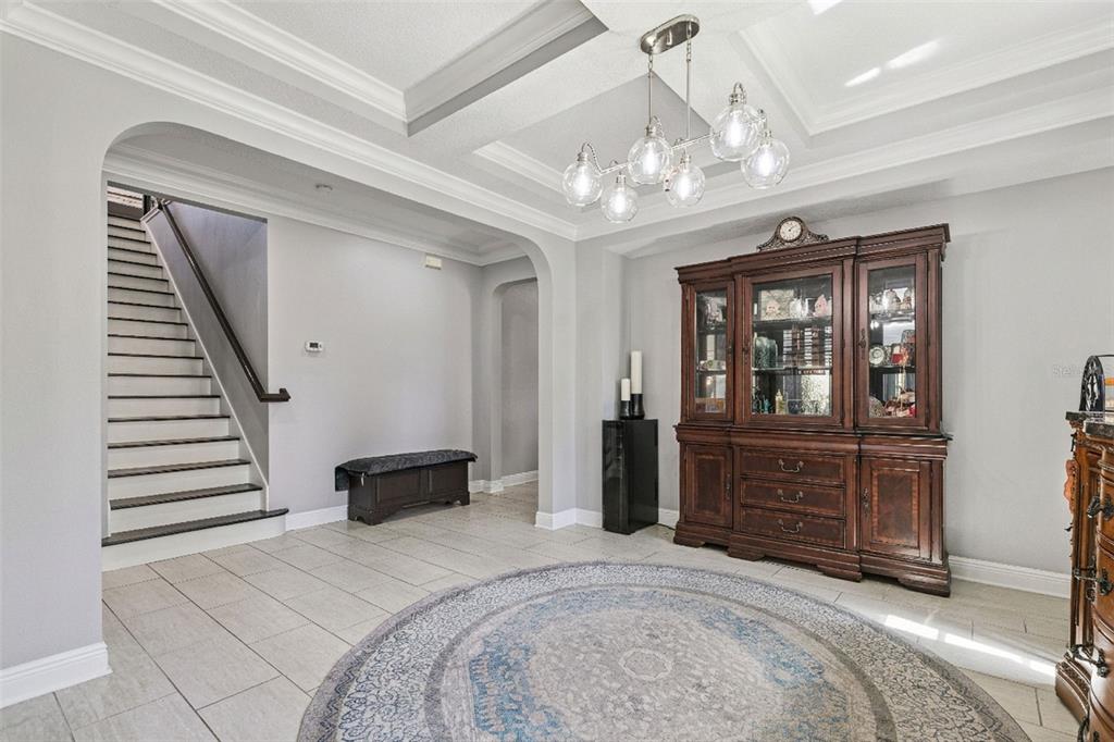 2541 Red Berry Way Ocoee, FL 34761 - Photo 7 of 49 a bedroom with a bed and a dresser