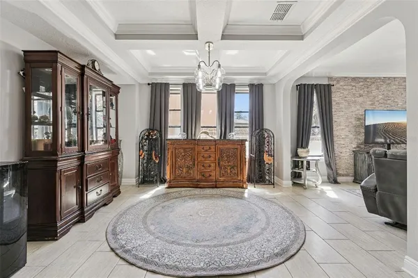 a view of a livingroom with fireplace and furniture