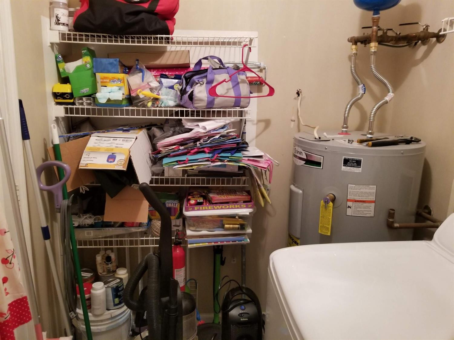 2730 Van Thompson Road Mount Sterling, KY 40353 - Photo 15 of 32 Shelves and hot water heater in utility