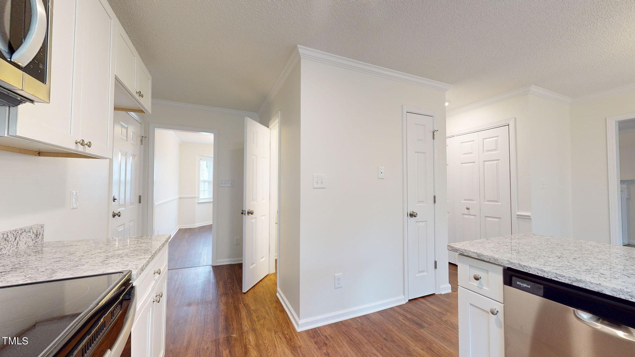 4805 Topstone Road Raleigh, NC 27603 - Photo 32 of 43 a view of a kitchen cabinets a sink and wooden floor