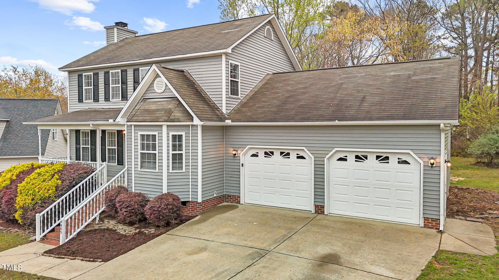 4805 Topstone Road Raleigh, NC 27603 - Photo 8 of 43 a front view of a house with a garage
