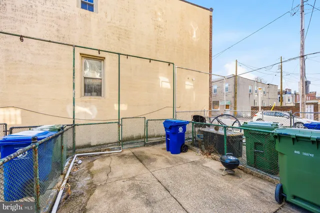 a view of a balcony with chairs