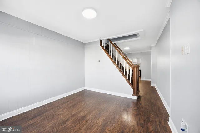 a view of entryway with wooden floor