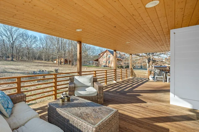 a view of a two chairs in the patio