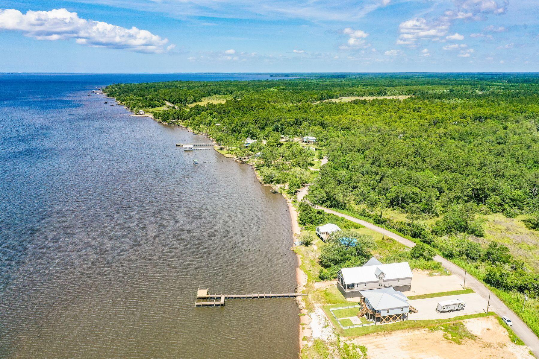 474 Beatrice Point Road Freeport, FL 32439 - Photo 28 of 69 a view of a yard with an outdoor space