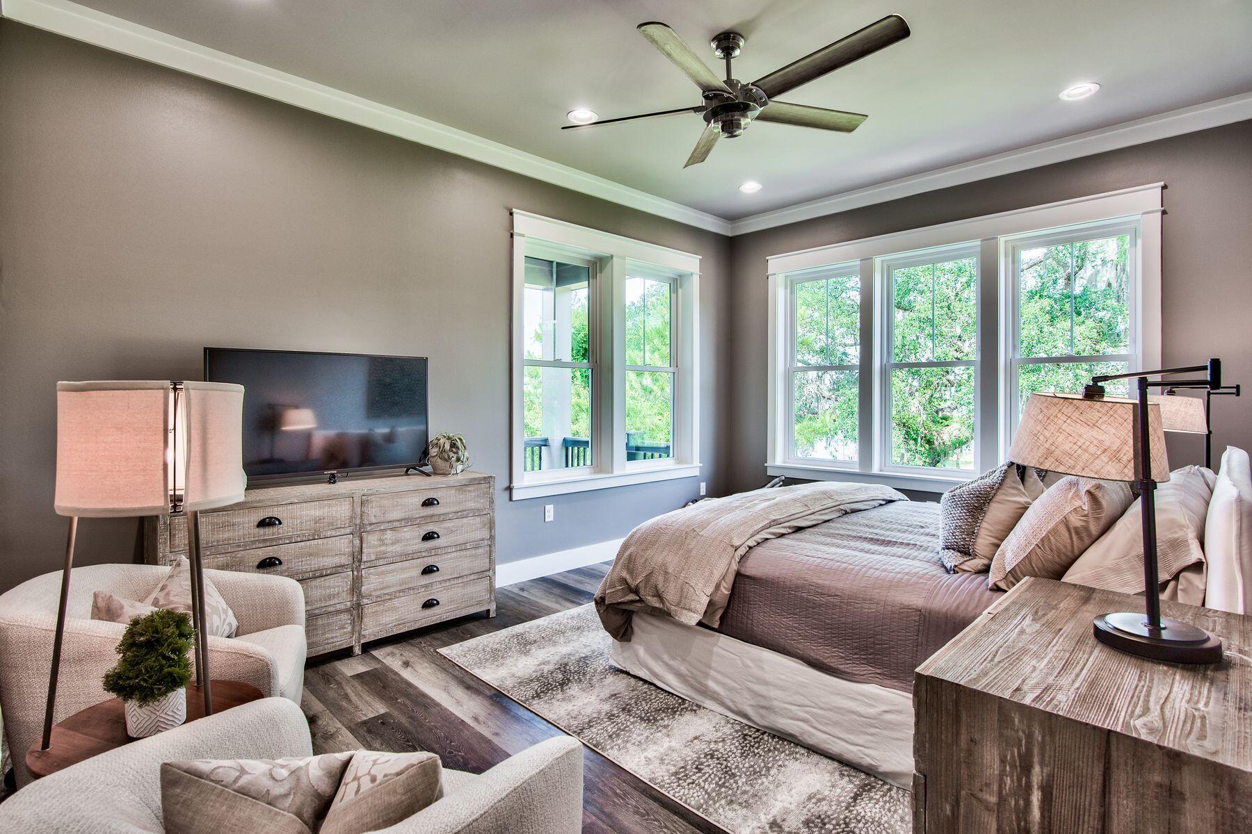 474 Beatrice Point Road Freeport, FL 32439 - Photo 36 of 69 a bedroom with furniture and a flat screen tv