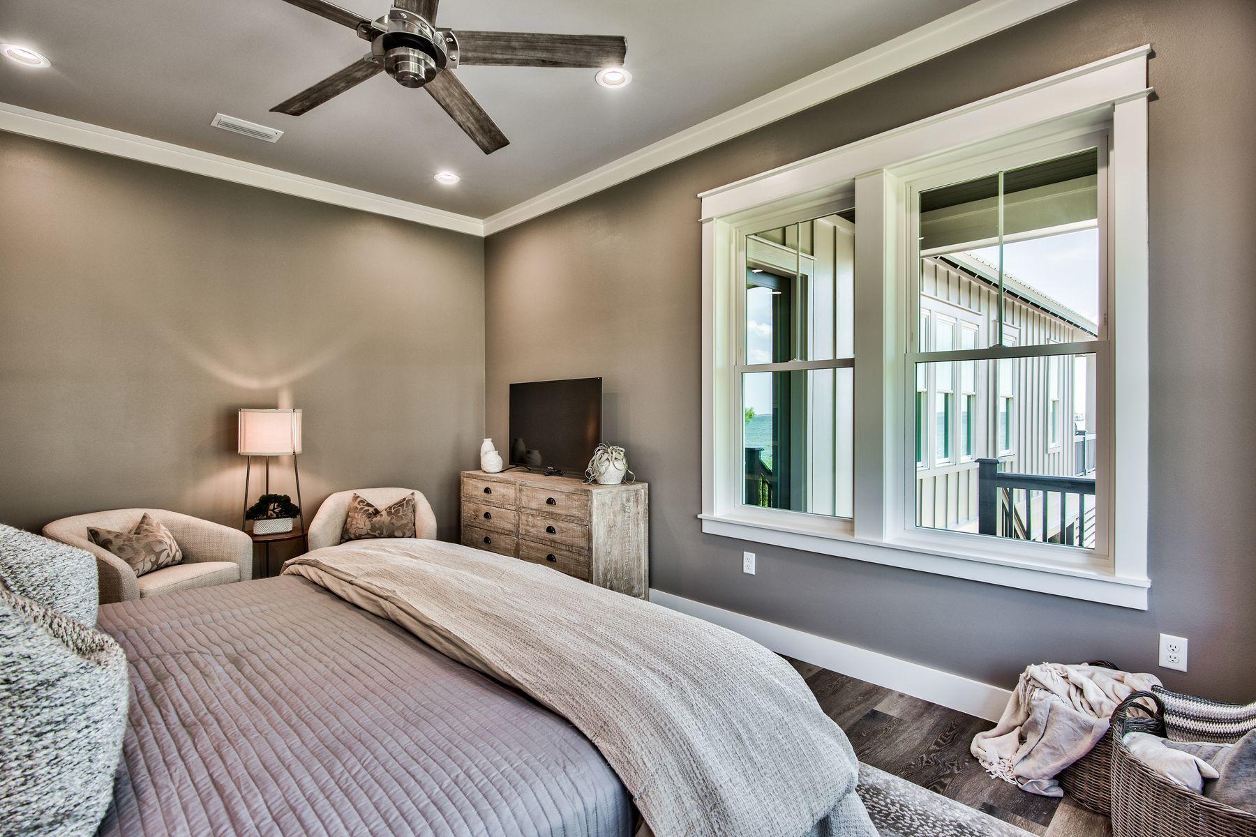 474 Beatrice Point Road Freeport, FL 32439 - Photo 37 of 69 a bedroom with a bed and a window