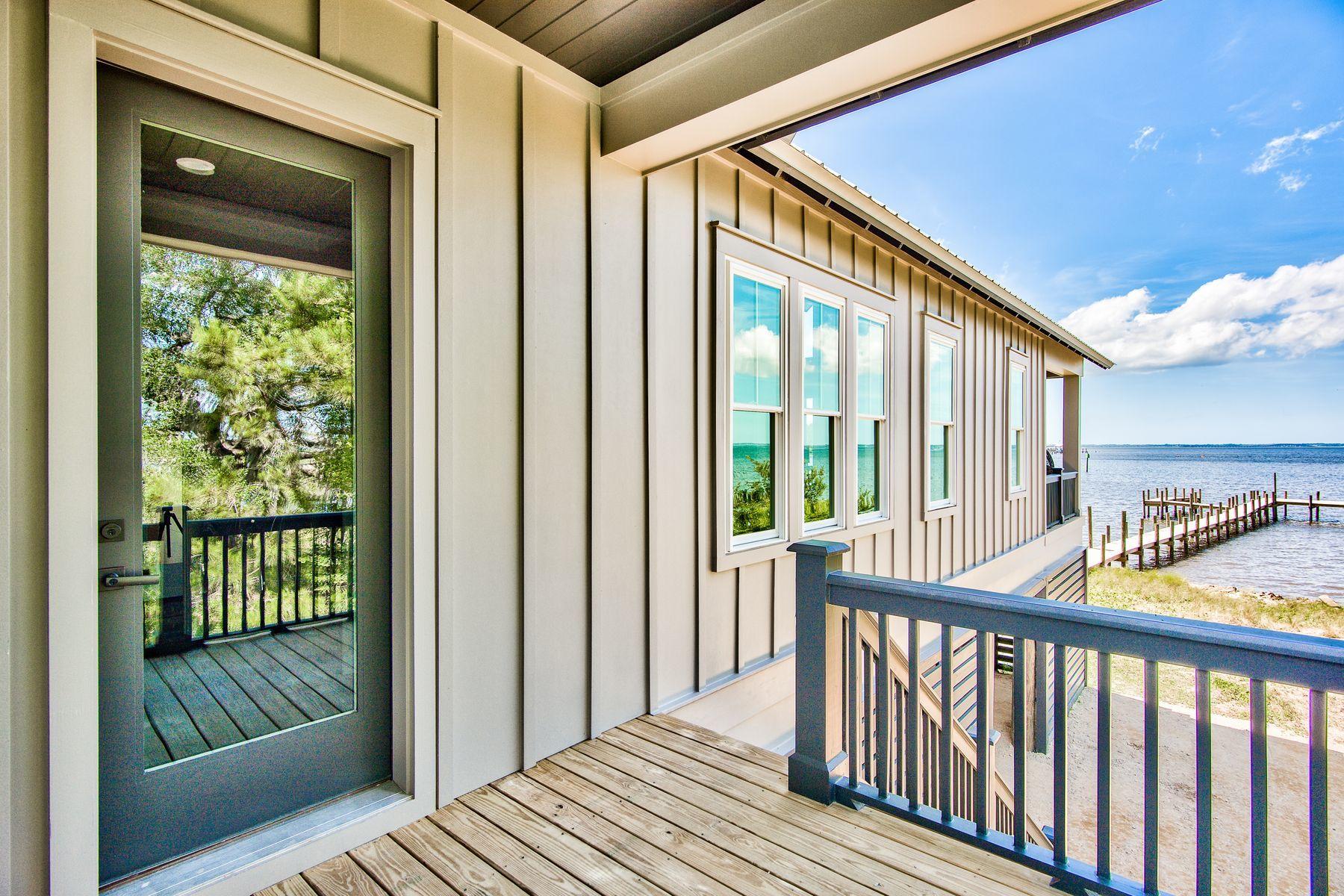 474 Beatrice Point Road Freeport, FL 32439 - Photo 56 of 69 a view of a balcony with wooden floor