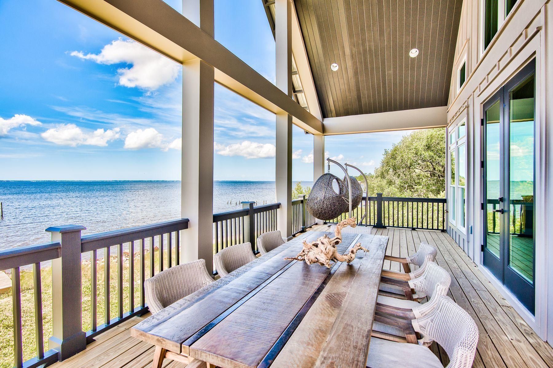 474 Beatrice Point Road Freeport, FL 32439 - Photo 58 of 69 a view of a balcony with furniture