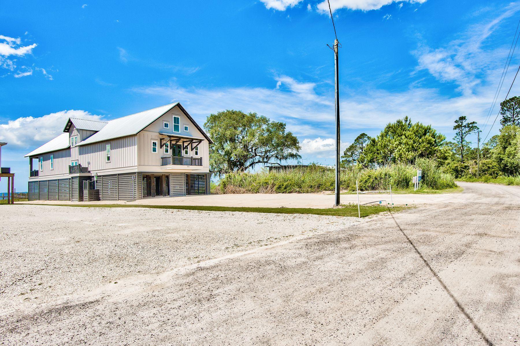 474 Beatrice Point Road Freeport, FL 32439 - Photo 66 of 69 a front view of a house with a yard