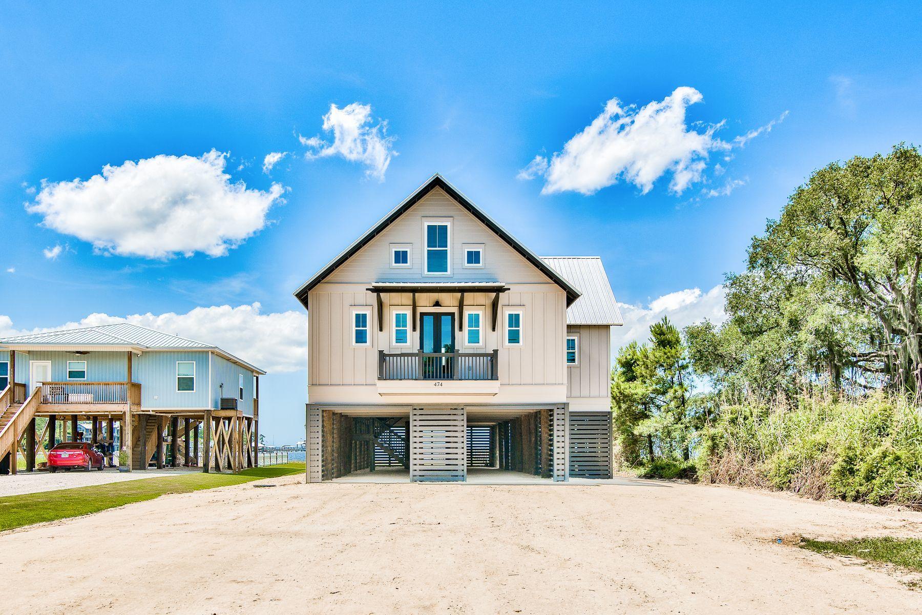 474 Beatrice Point Road Freeport, FL 32439 - Photo 68 of 69 a view of a house with a yard
