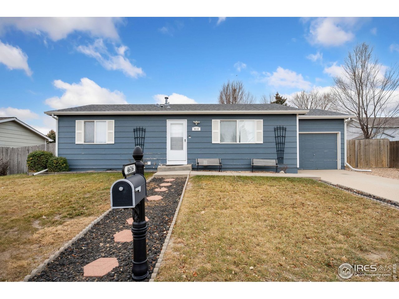 a house view with a backyard space