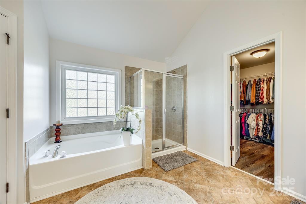 4005 Sedgewick Road Indian Trail, NC 28079 - Photo 19 of 38 a bathroom with a tub and a window