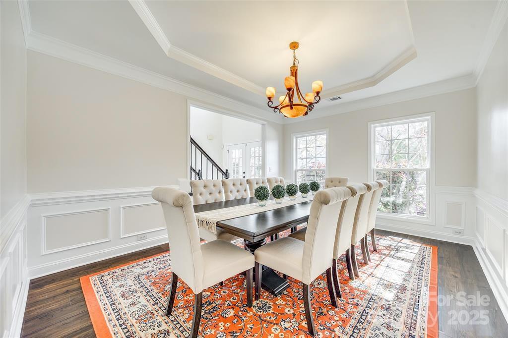 4005 Sedgewick Road Indian Trail, NC 28079 - Photo 5 of 38 a view of a dining room with furniture window and wooden floor
