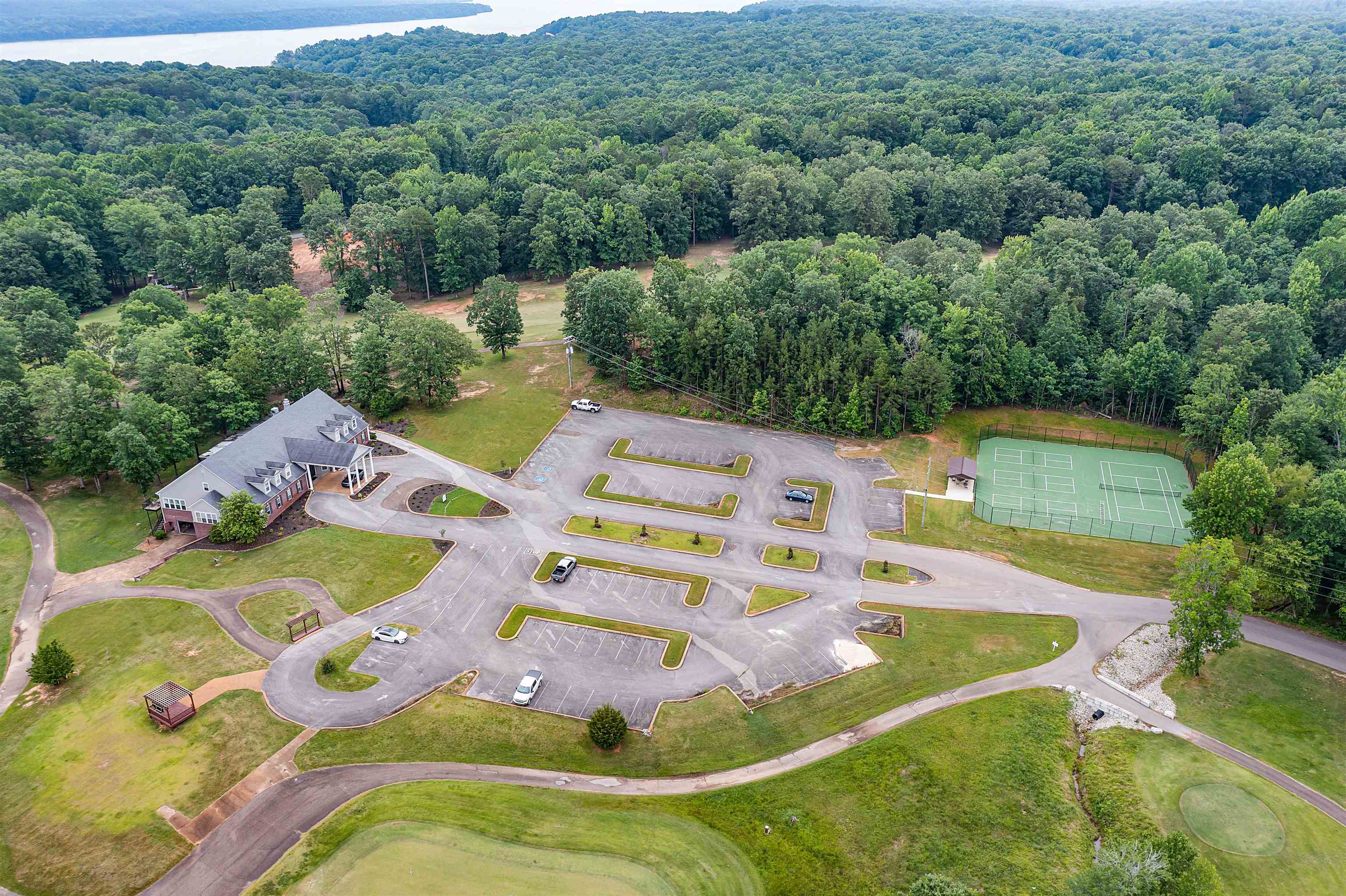 180 Vantage Pointe Counce, TN 38326 - Photo 29 of 30 a view of a swimming pool with a yard