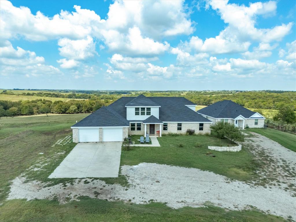 781 Alsdorf Road Ennis, TX 75119 - Photo 3 of 39 a view of a yard in front of a house