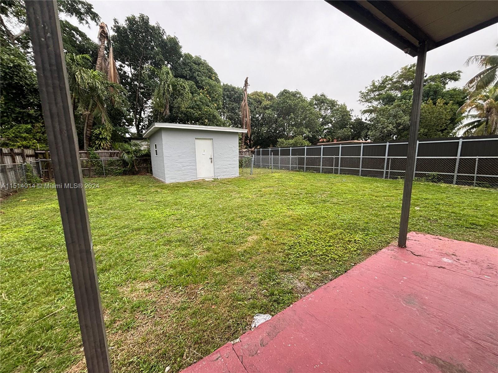 111 Southwest 31st Court, Unit 1 Miami, FL 33135 - Photo 13 of 14 a view of a backyard with a garden