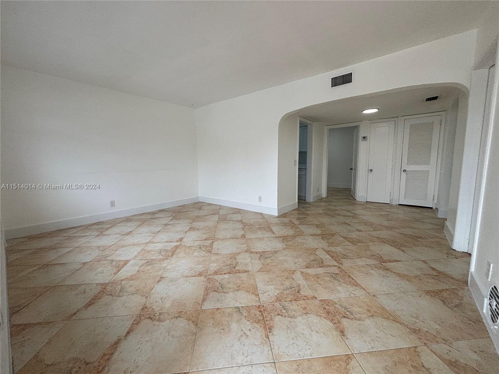 111 Southwest 31st Court, Unit 1 Miami, FL 33135 - Photo 2 of 14 a view of an empty room