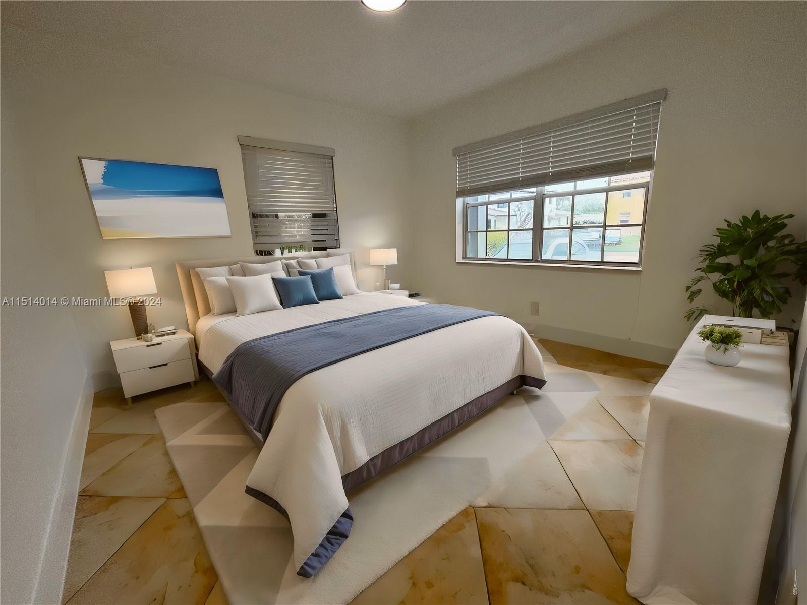 111 Southwest 31st Court, Unit 1 Miami, FL 33135 - Photo 3 of 14 a bedroom with bed and a window