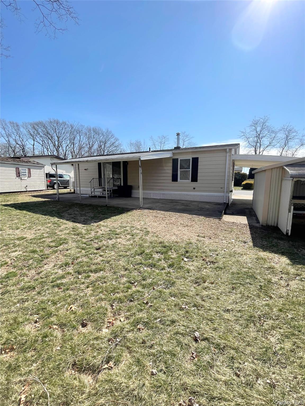 1661 Old Country Road, Unit 398 Riverhead, NY 11901 - Photo 4 of 14 a view of a terrace