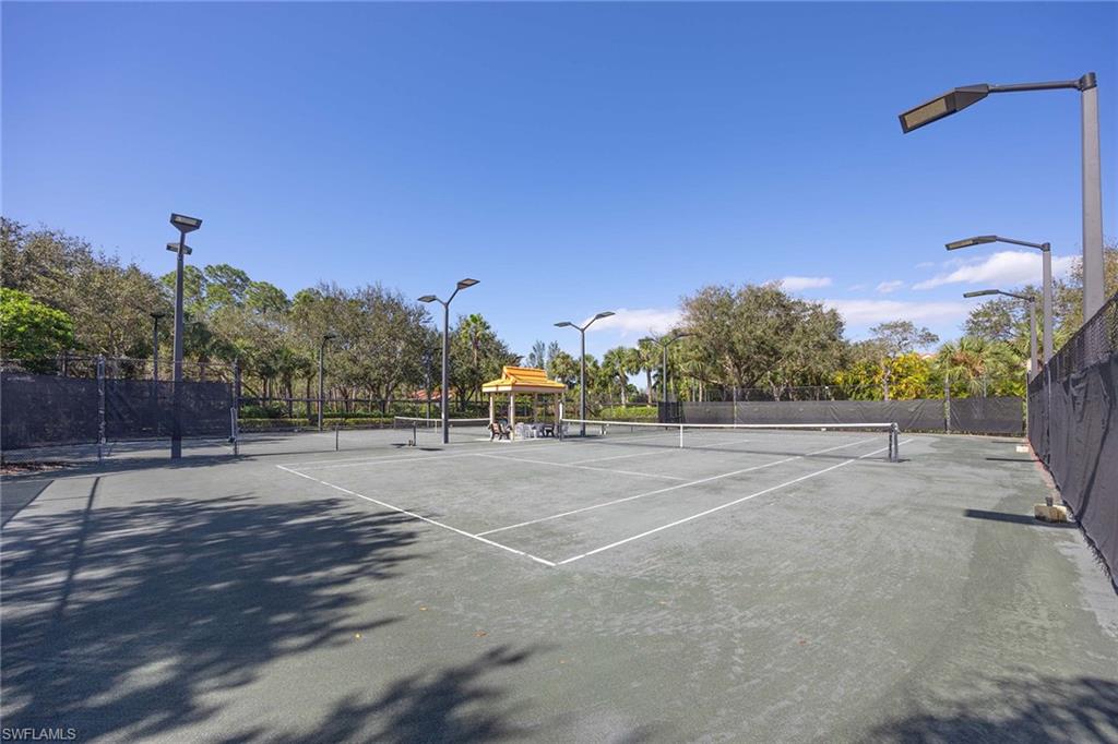 1625 Windy Pines Drive, Unit 5 Naples, FL 34112 - Photo 38 of 43 a view of a basketball court