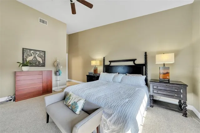 a bedroom with a bed and furniture