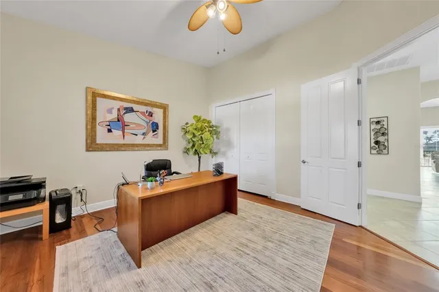 a room with furniture and wooden floor