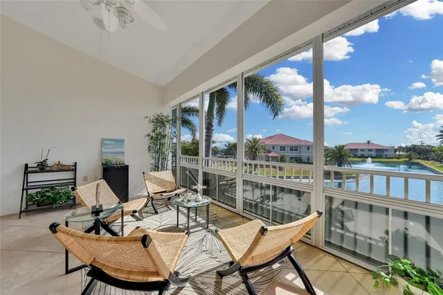 a view of a balcony with chairs