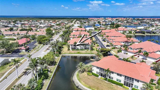 an aerial view of a house with a swimming pool