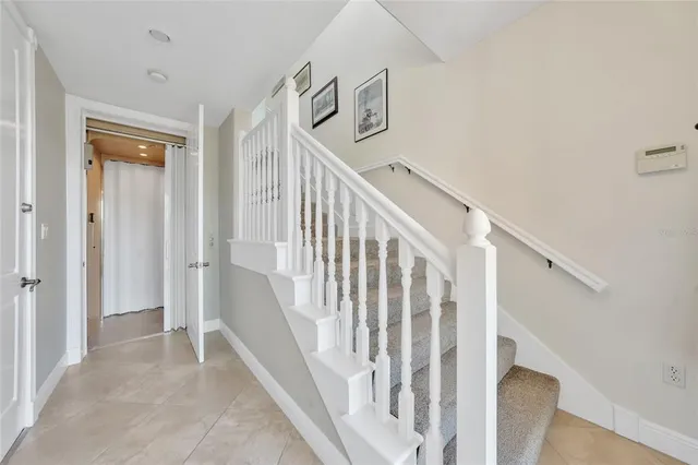 a view of entryway with stairs