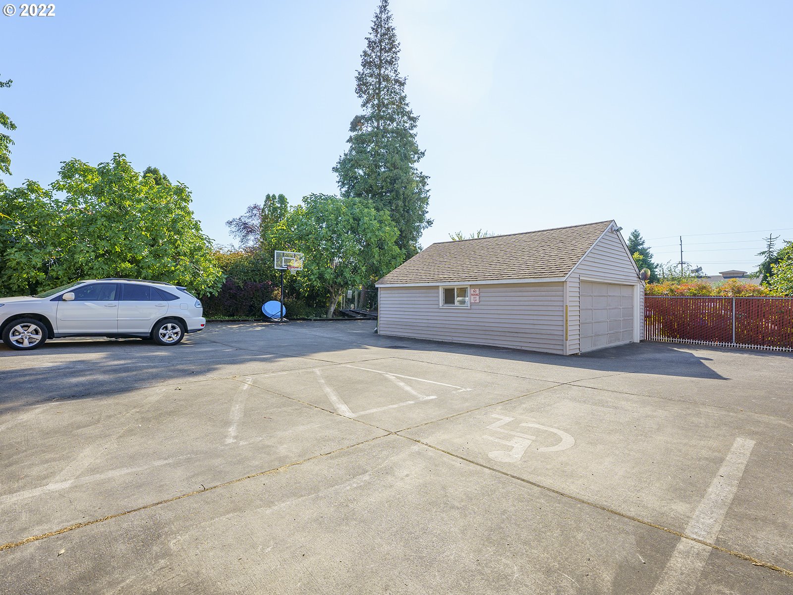 4530 Southwest 110th Avenue Beaverton, OR 97005 - Photo 31 of 32 a front view of a house with a garden