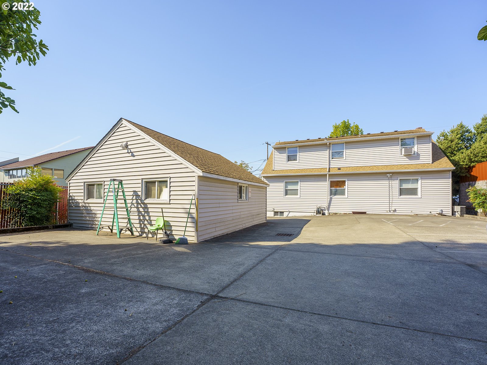 4530 Southwest 110th Avenue Beaverton, OR 97005 - Photo 32 of 32 a front view of a house with a yard and garage