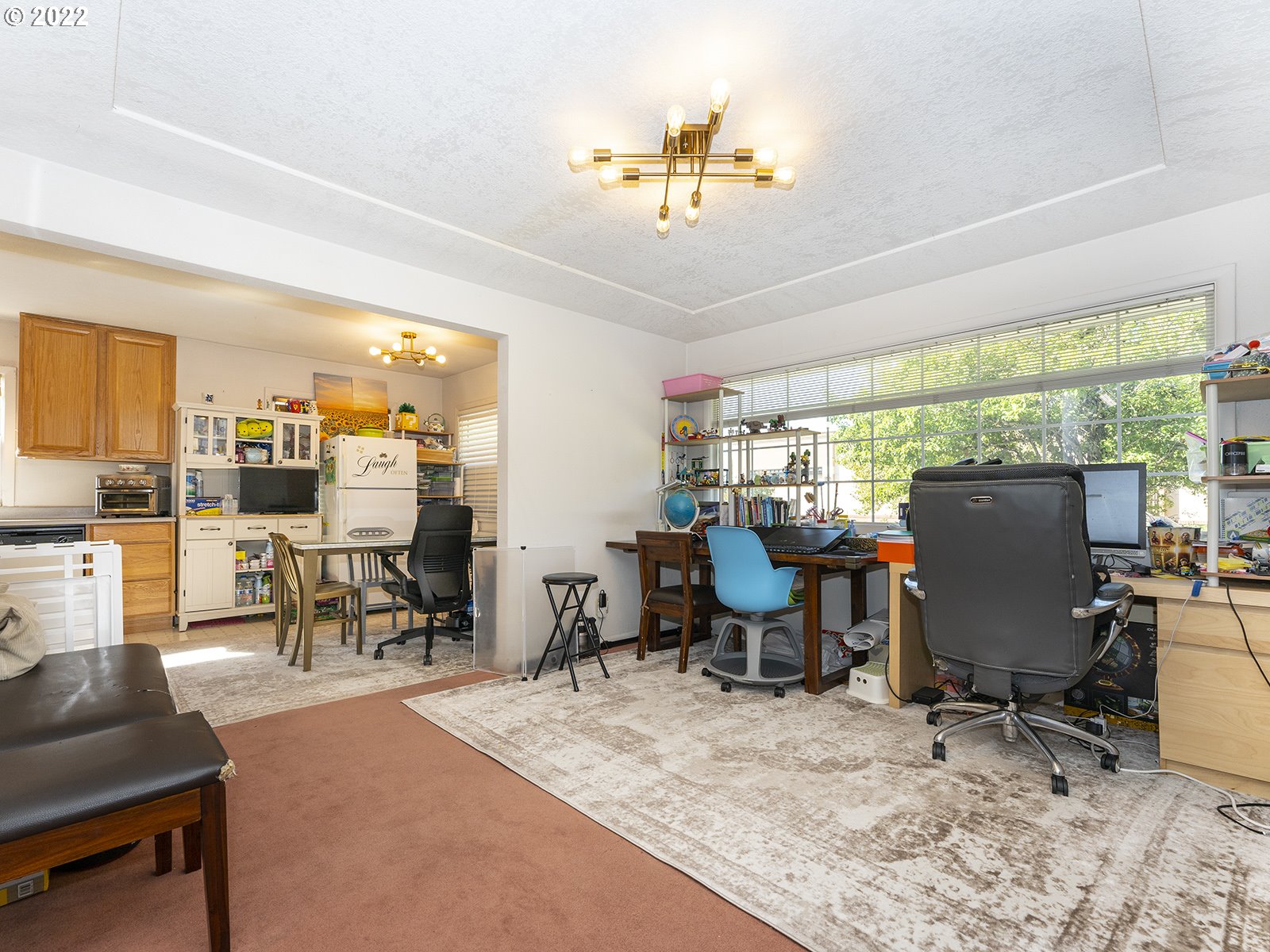 4530 Southwest 110th Avenue Beaverton, OR 97005 - Photo 10 of 32 a view of a dining room with furniture window and outside view