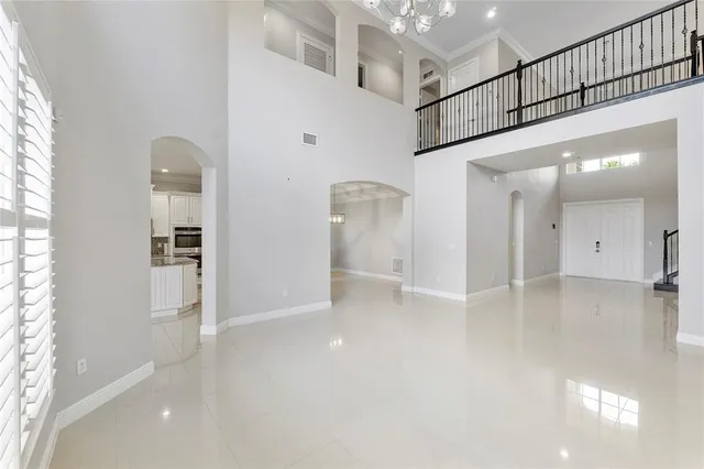 a view of a hallway view with staircase