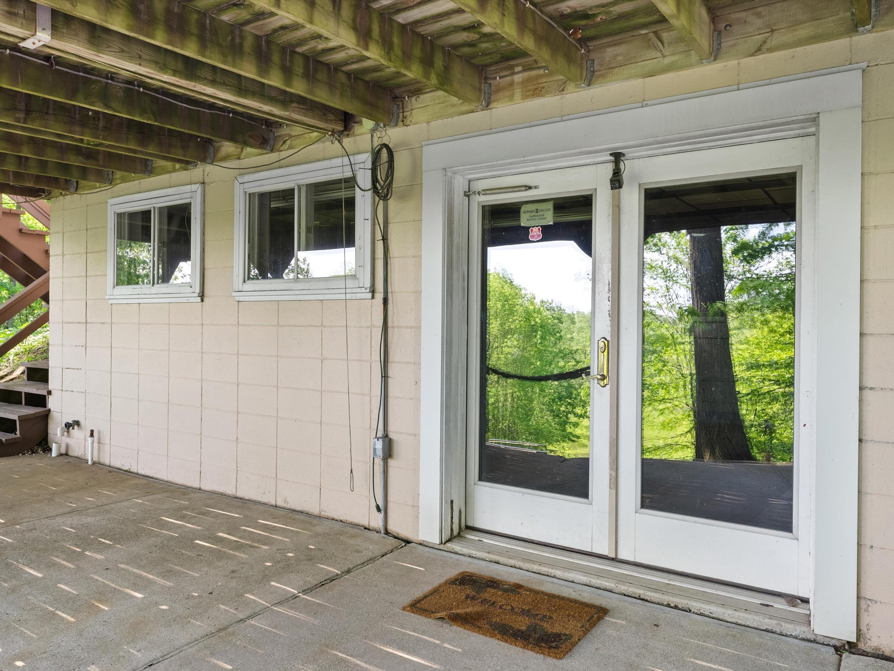 1608 North Rapids Road Manitowoc, WI 54220 - Photo 15 of 72 Patio off Lower Shop Room