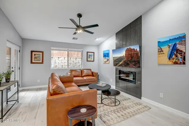 a living room with furniture and a window