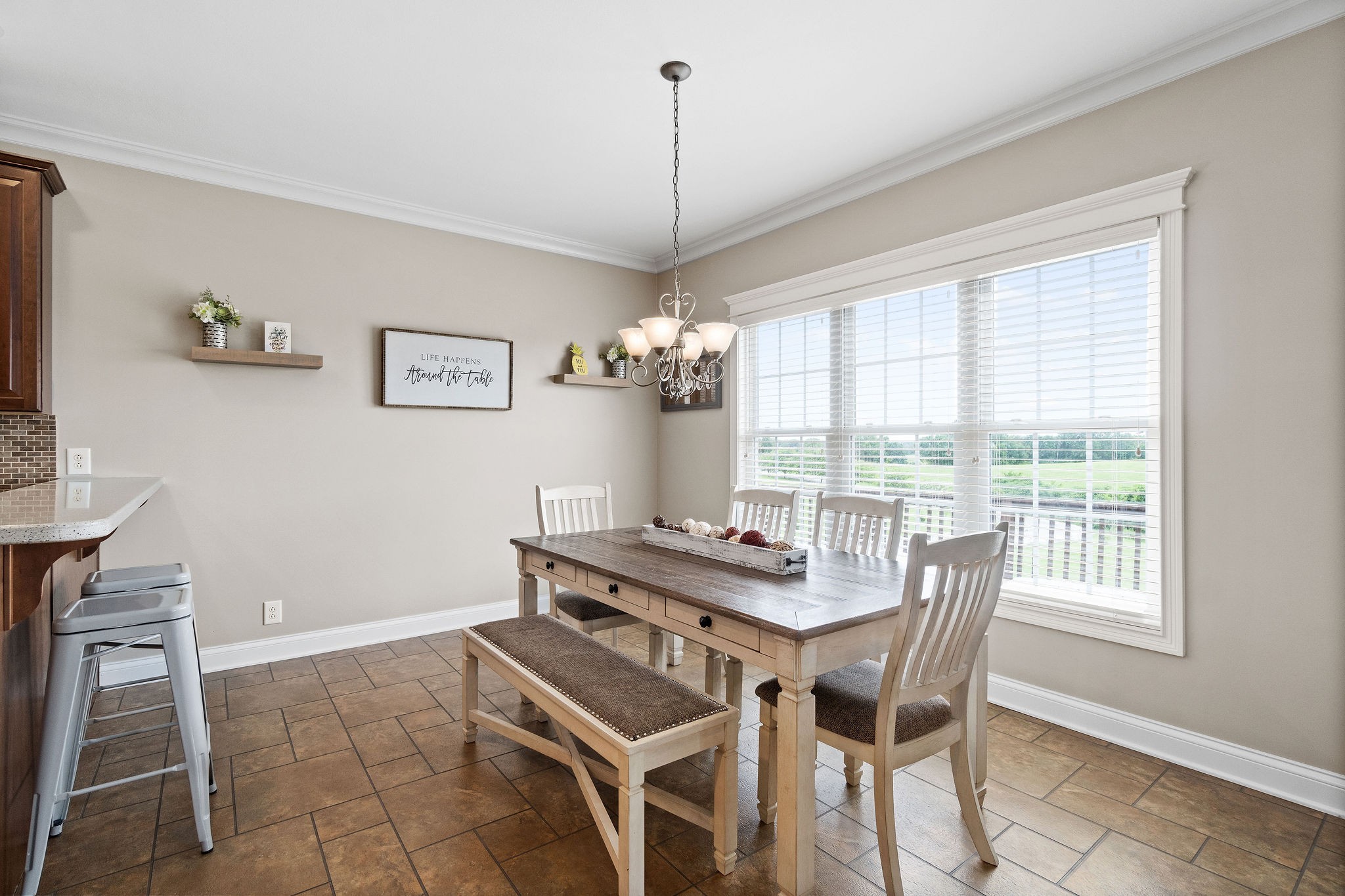 701 7 Mile Ferry Road Cunningham, TN 37052 - Photo 13 of 36 a view of a dining room with furniture window and outside view