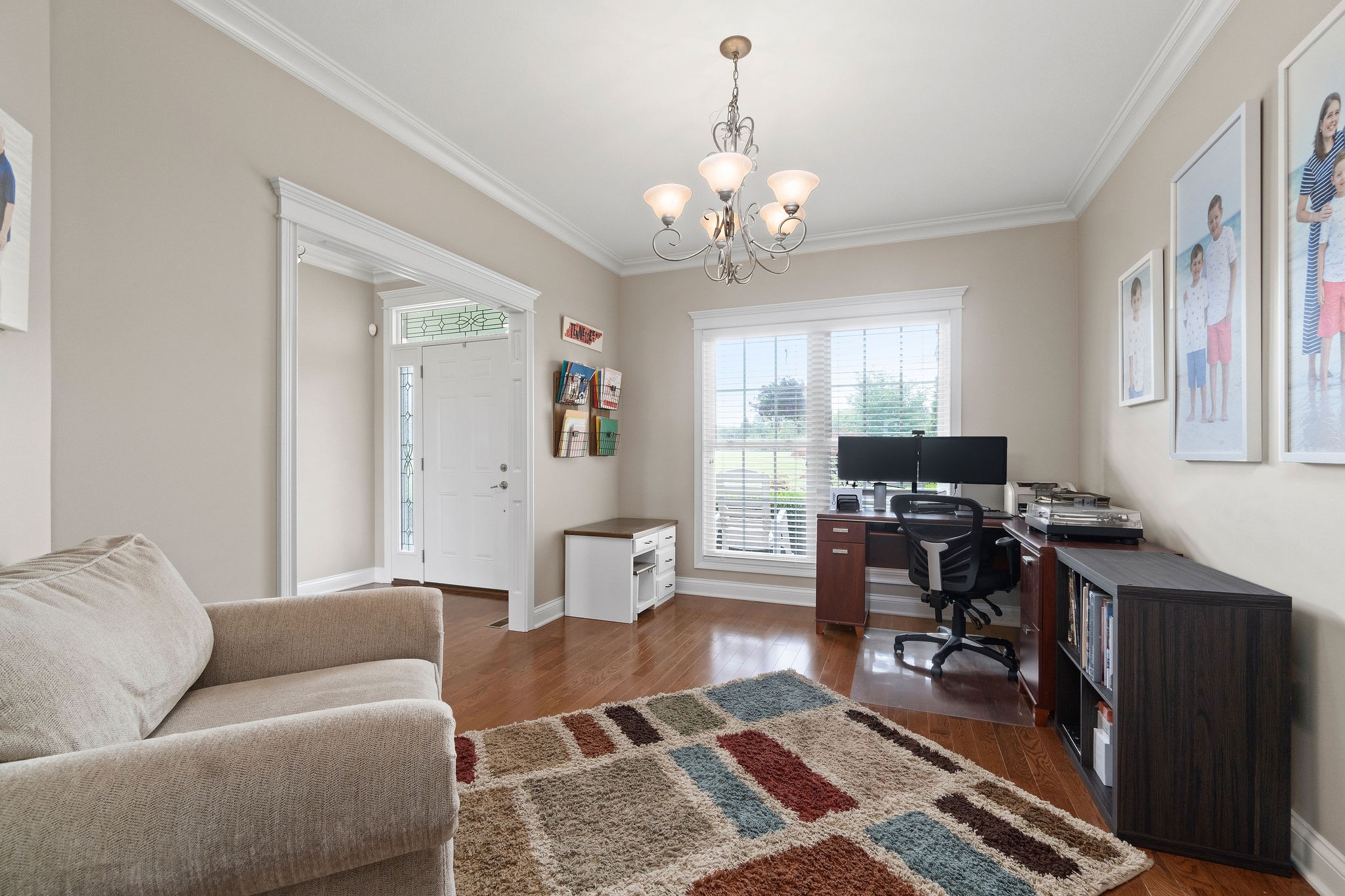 701 7 Mile Ferry Road Cunningham, TN 37052 - Photo 14 of 36 a living room with furniture a chandelier and a piano