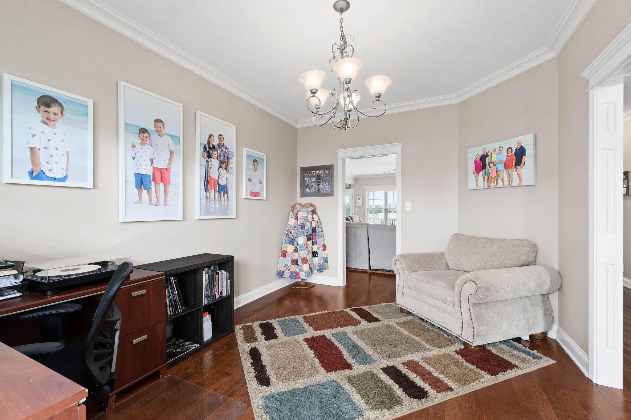701 7 Mile Ferry Road Cunningham, TN 37052 - Photo 15 of 36 a living room with furniture and a chandelier