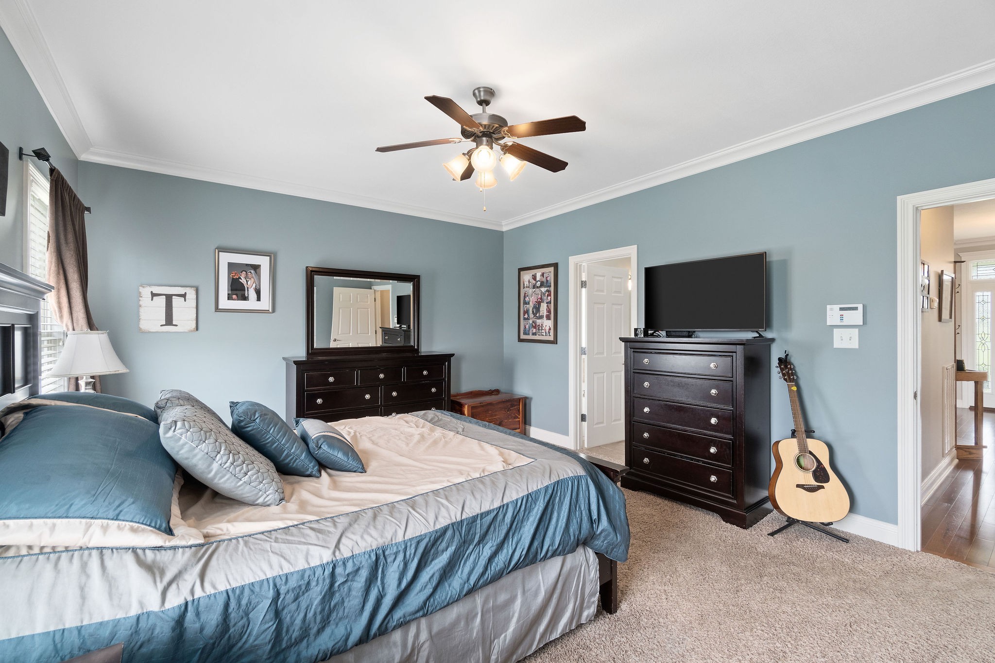 701 7 Mile Ferry Road Cunningham, TN 37052 - Photo 20 of 36 a bedroom with a bed and a flat screen tv