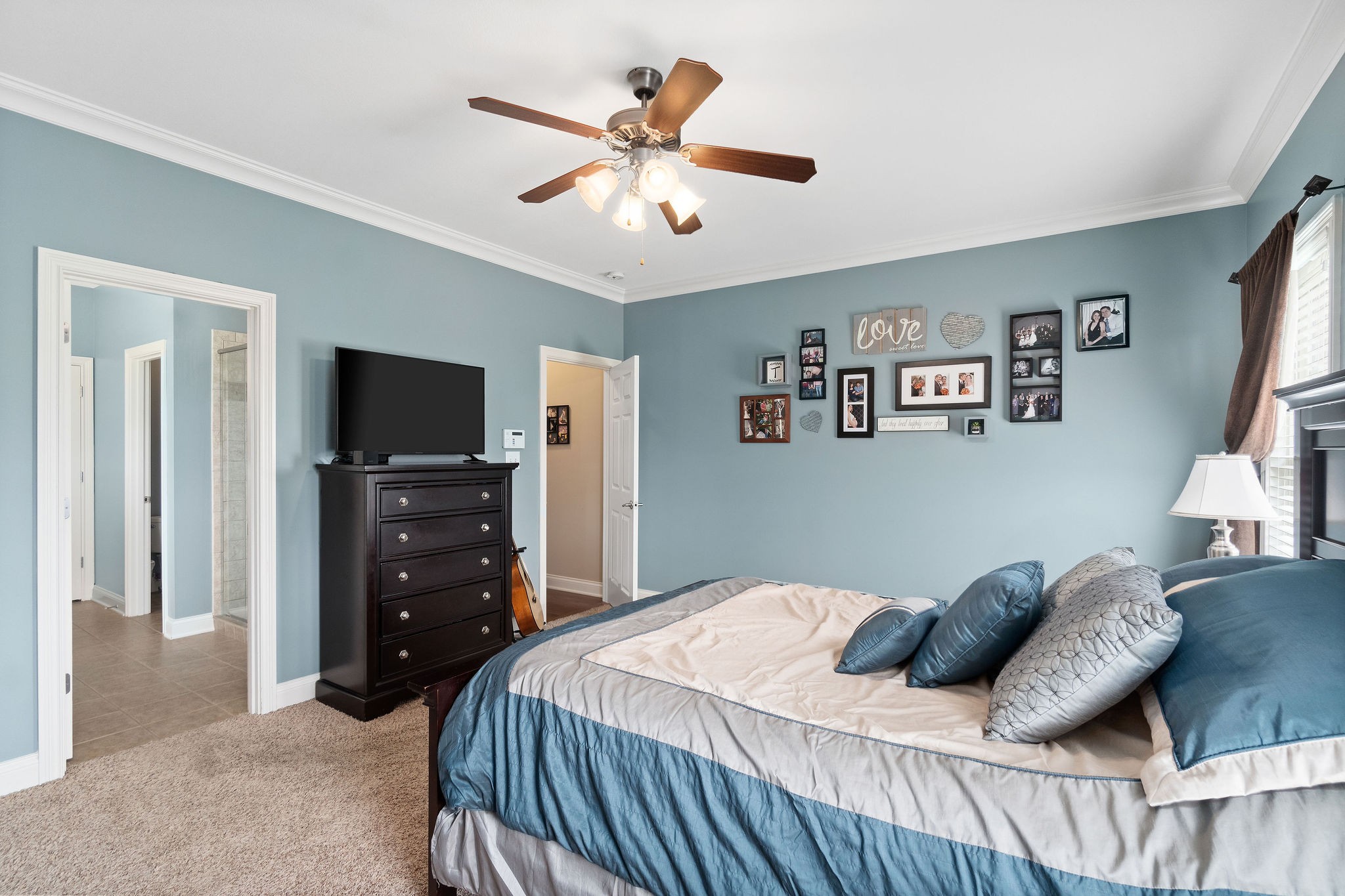 701 7 Mile Ferry Road Cunningham, TN 37052 - Photo 21 of 36 a bedroom with a bed and a flat screen tv