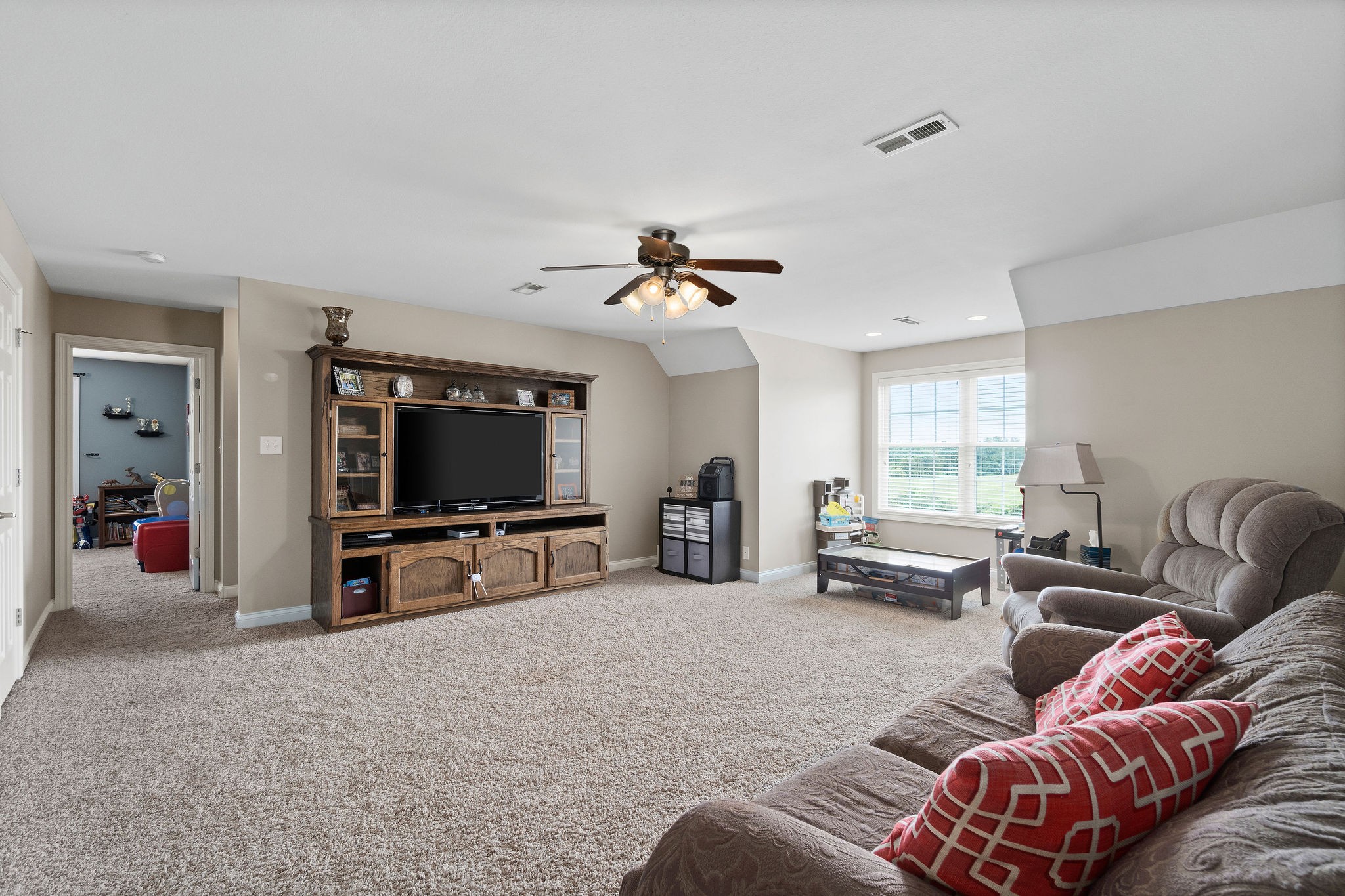 701 7 Mile Ferry Road Cunningham, TN 37052 - Photo 22 of 36 a living room with furniture and a flat screen tv