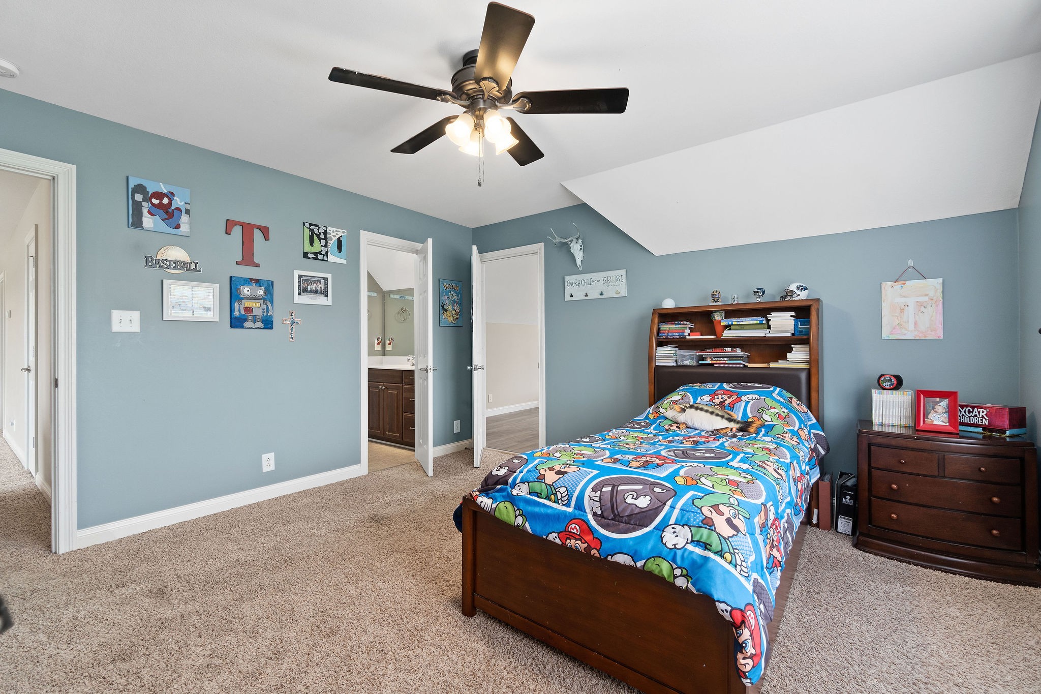 701 7 Mile Ferry Road Cunningham, TN 37052 - Photo 23 of 36 a bedroom with a bed and a chandelier