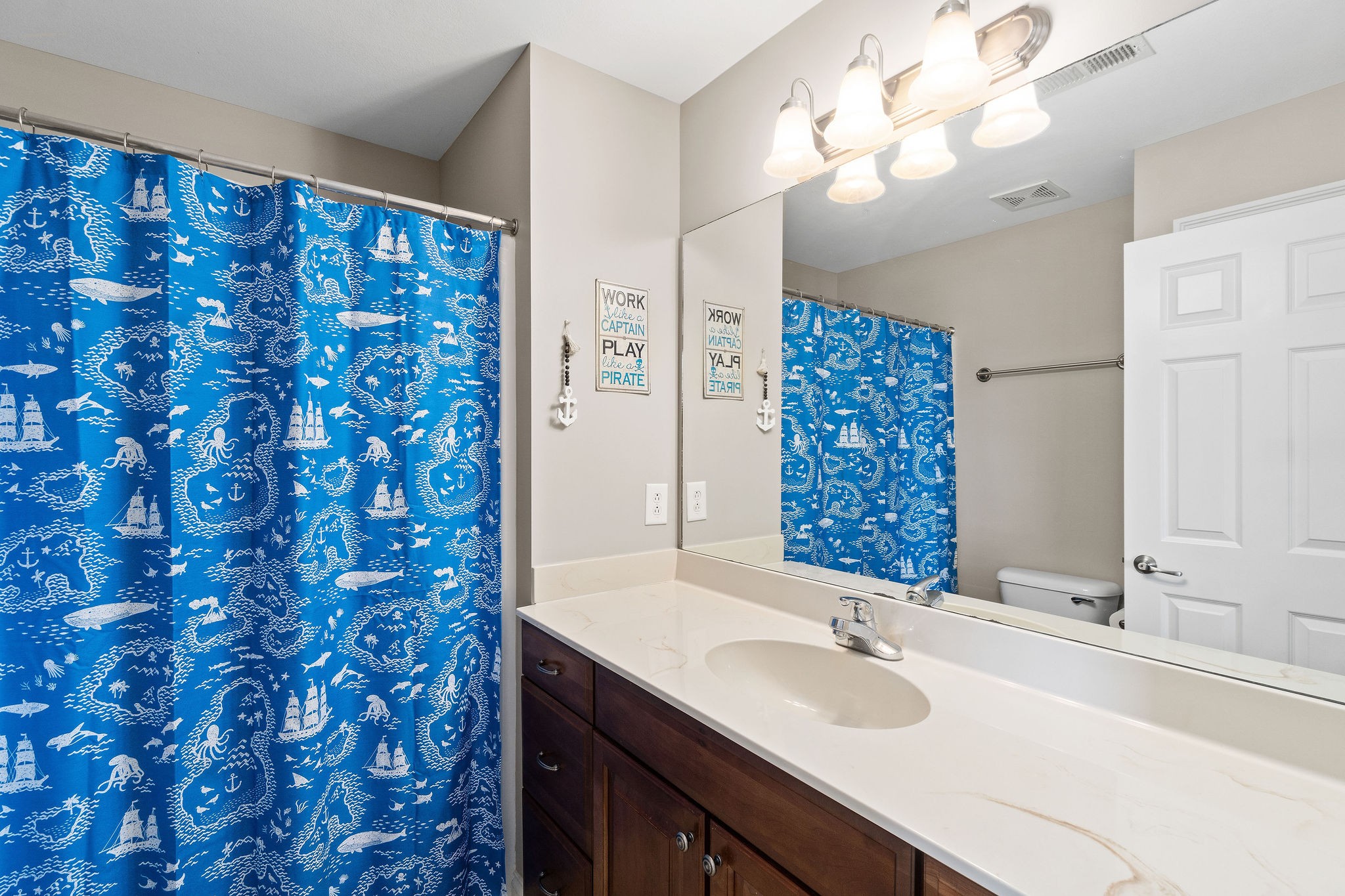 701 7 Mile Ferry Road Cunningham, TN 37052 - Photo 24 of 36 a bathroom with a sink a double vanity and a mirror