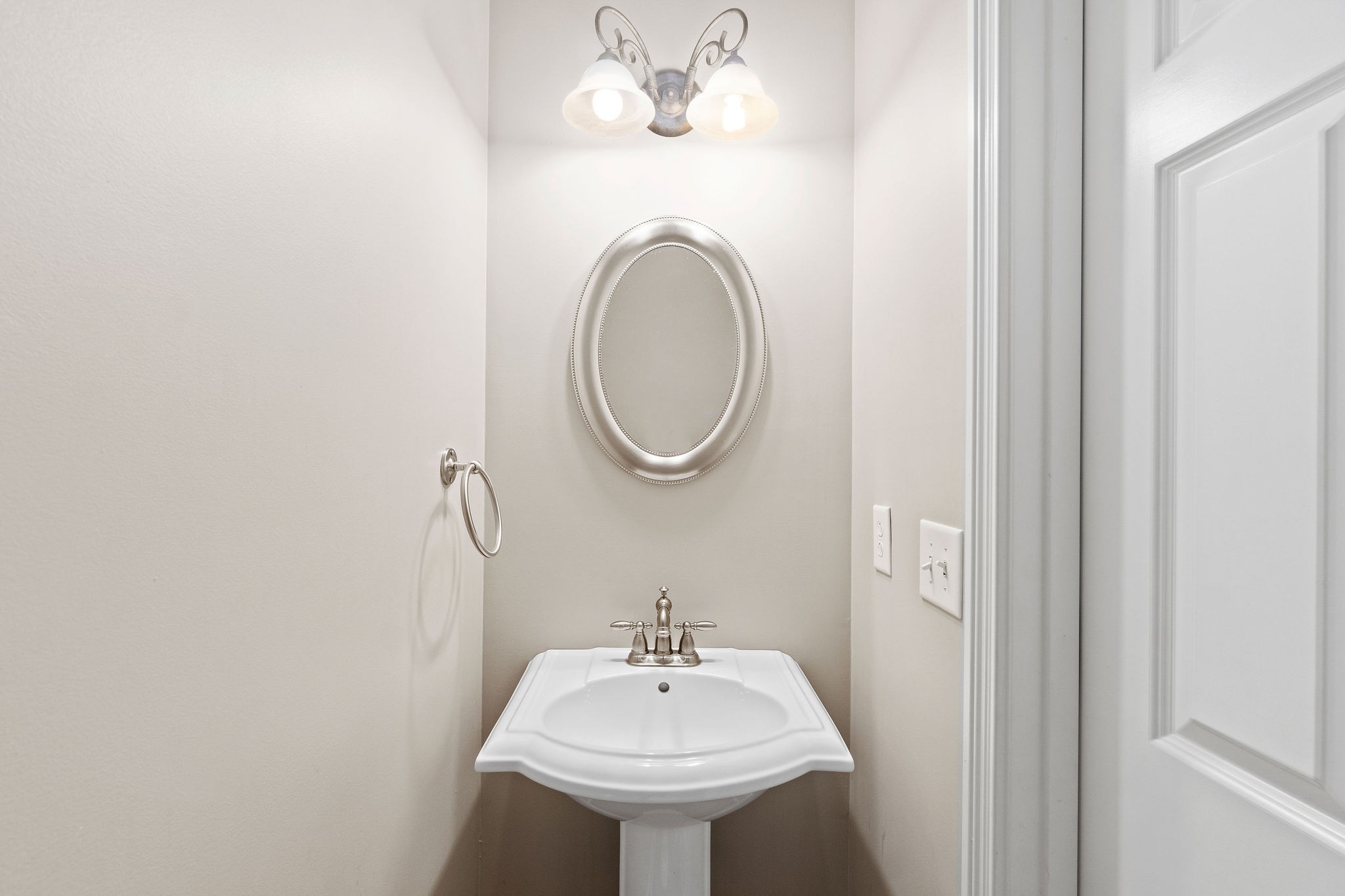 701 7 Mile Ferry Road Cunningham, TN 37052 - Photo 29 of 36 a bathroom with a sink and a mirror