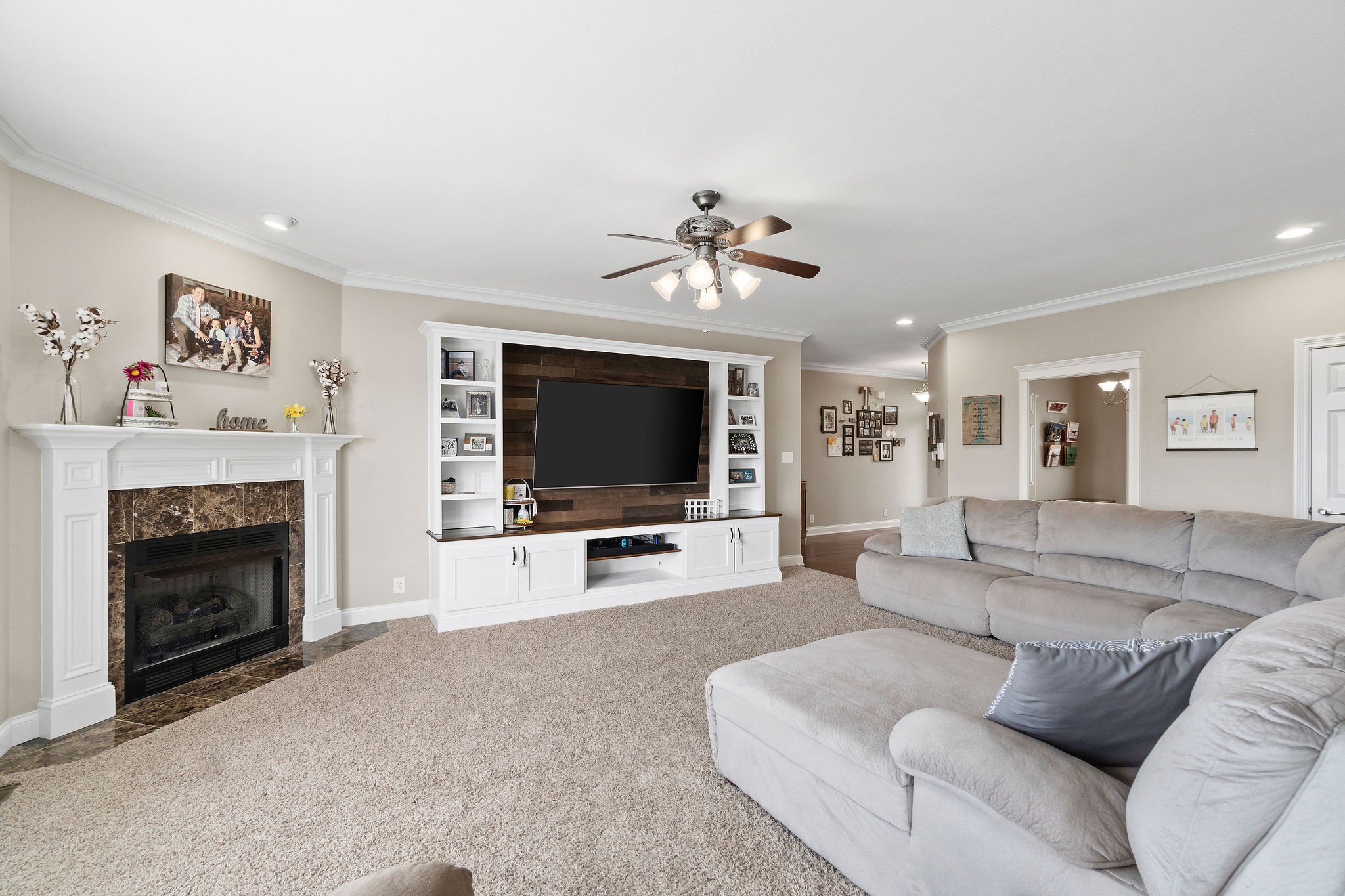 701 7 Mile Ferry Road Cunningham, TN 37052 - Photo 5 of 36 a living room with furniture a flat screen tv and a fireplace