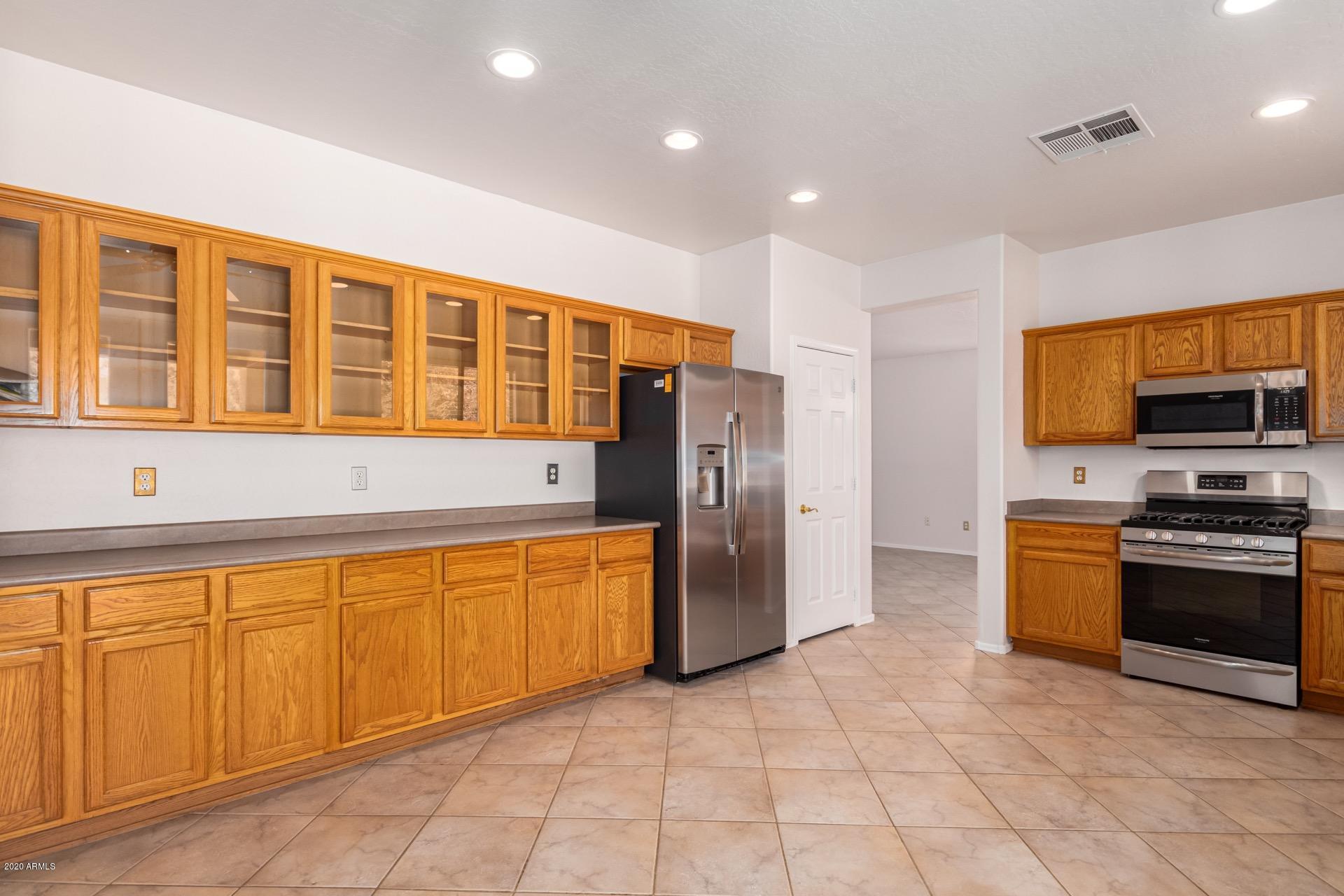 926 East Del Rio Street Gilbert, AZ 85295 - Photo 10 of 39 Extended Butler Style Cabinets/Pantry